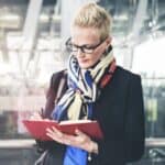 Businesswoman Writing Waiting Flight Concept